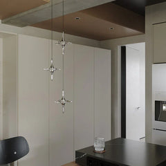 Modern glass pendant lights in a minimalist kitchen, premium designer lighting by YH Lamps.