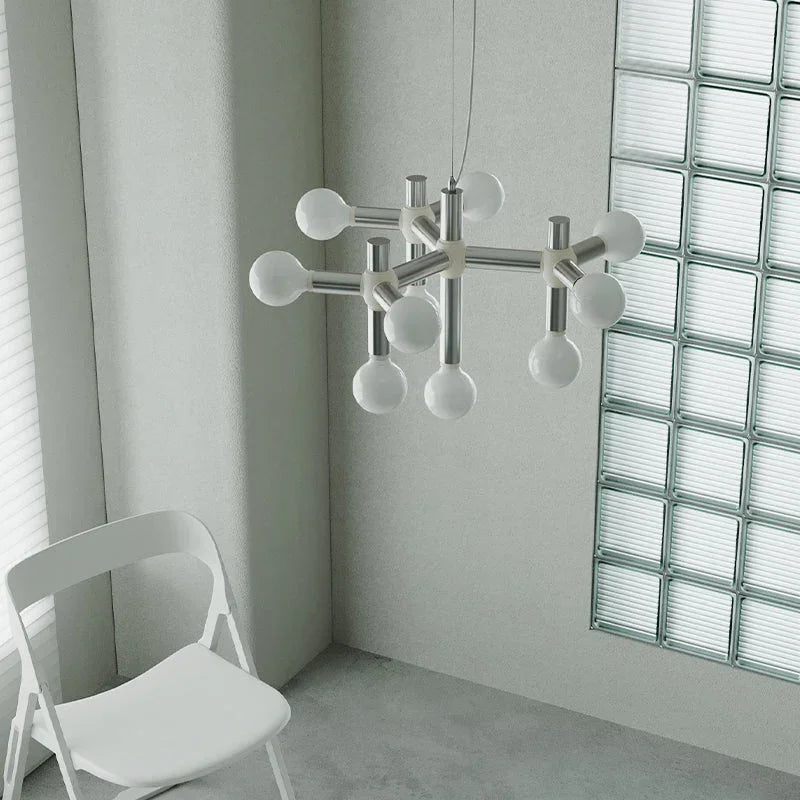 Modern designer chandelier with exposed bulbs in minimalist room, YH Lamps premium lighting