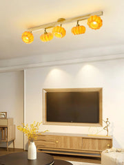 Modern living room with YH Lamps yellow pumpkin-style multi-head ceiling light fixture