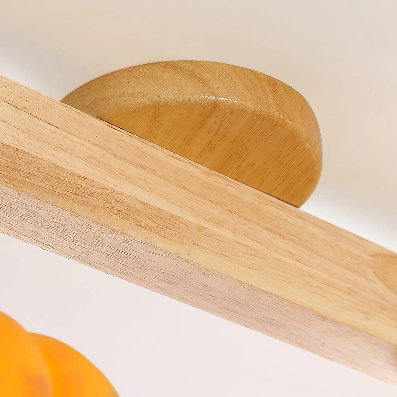 Close-up of YH Lamps ceiling lamp with natural wood finish, modern home lighting detail