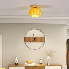 Yellow wood pumpkin ceiling light fixture in modern home interior by YH Lamps