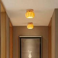 Modern hallway with two YH Lamps pumpkin ceiling lights in yellow wood tone, warm ambient glow