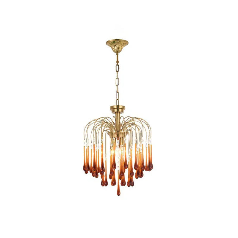 Modern brass chandelier pendant lamp with amber glass droplets, elegant home lighting fixture