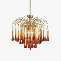 Modern brass chandelier pendant lamp with amber glass teardrop accents and crystal details