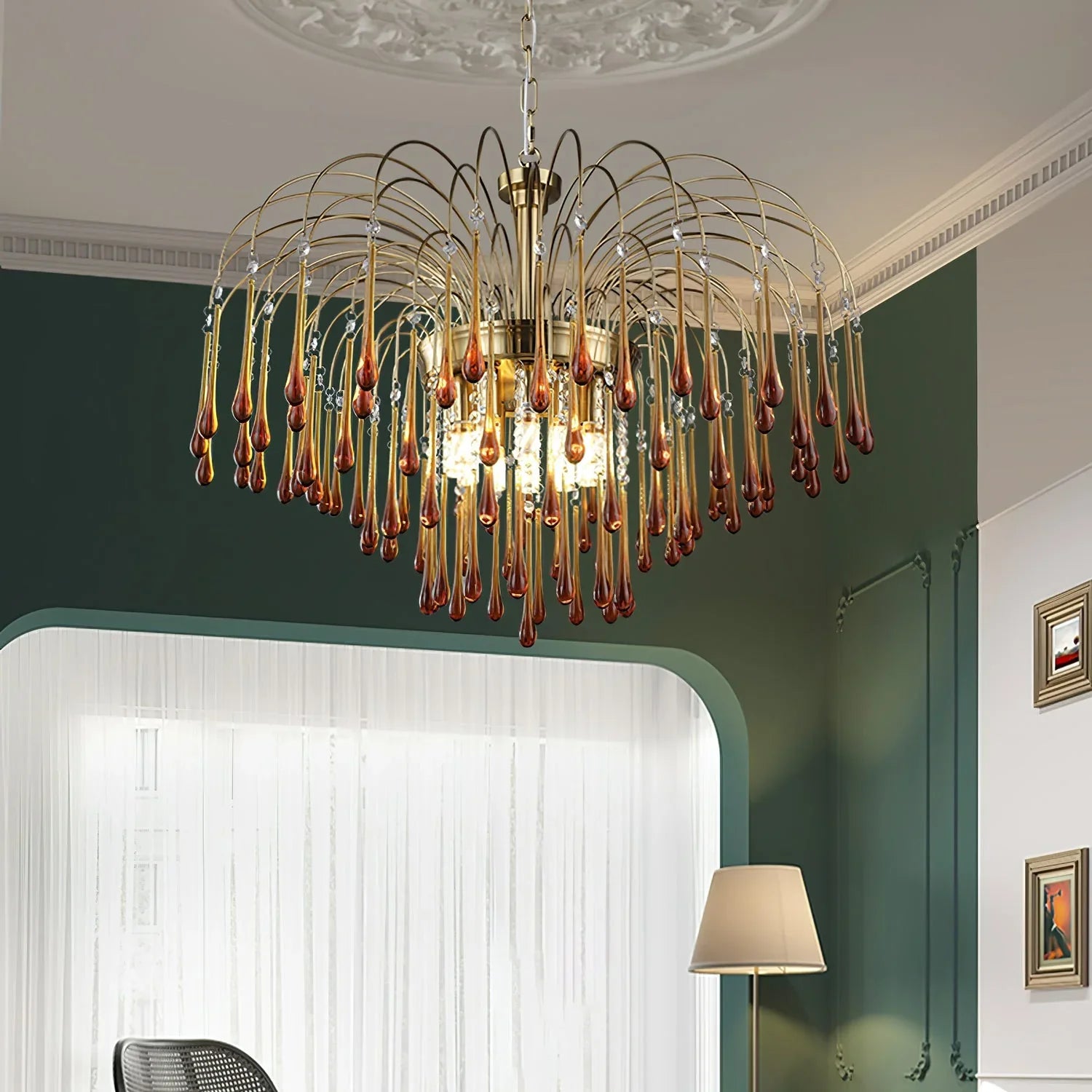 Modern brass chandelier with cascading amber glass droplets in elegant living room