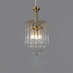 Modern brass pendant chandelier with hanging clear maltose glass drops and warm glowing bulbs