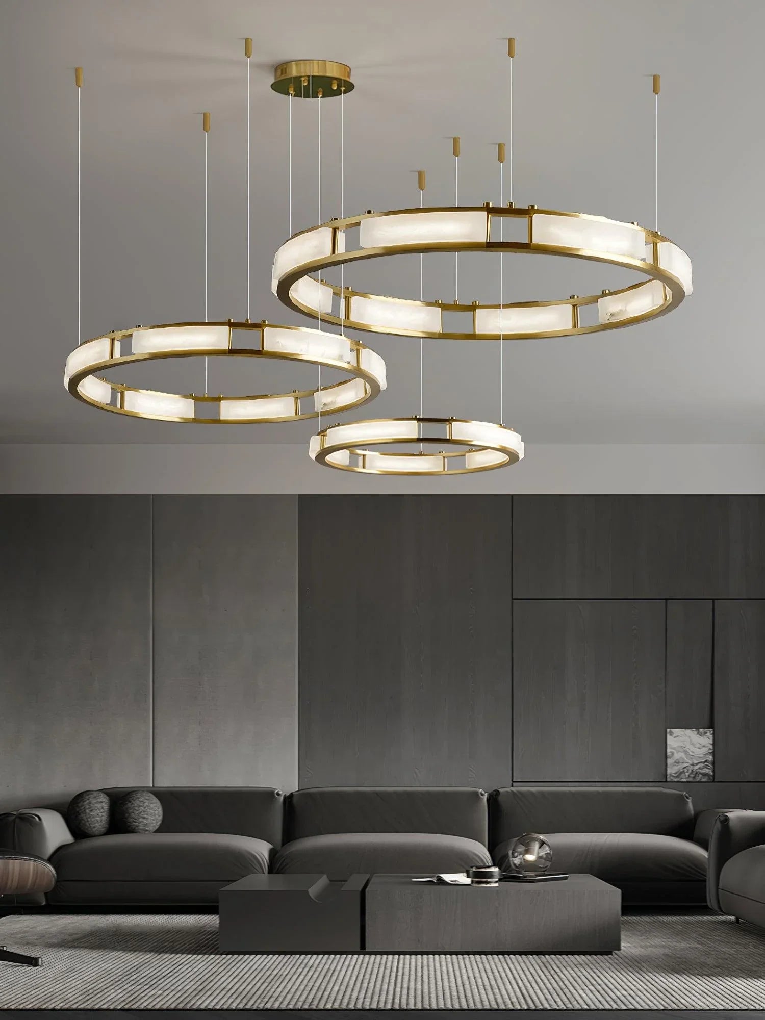 Modern living room featuring YH Lamps brass and alabaster pendant chandelier with three warm light rings