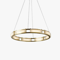 Modern circular brass chandelier with alabaster panels and warm white light, suspended by cables