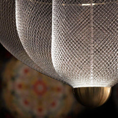Modern YH Lamps pendant chandelier with chrome mesh shade and gold base emitting warm light