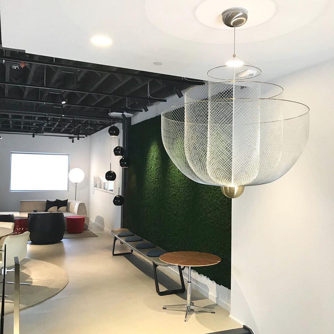 Modern living room with YH Lamps pendant lamp featuring a gold base and mesh design under warm light