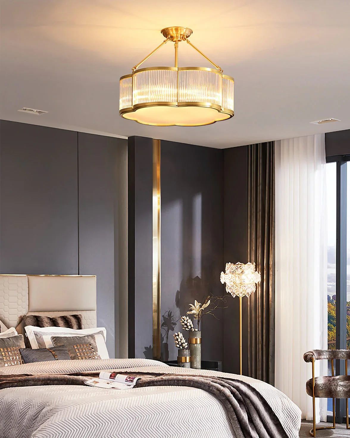 Modern brass chandelier pendant lamp illuminating a stylish bedroom, YH Lamps lighting
