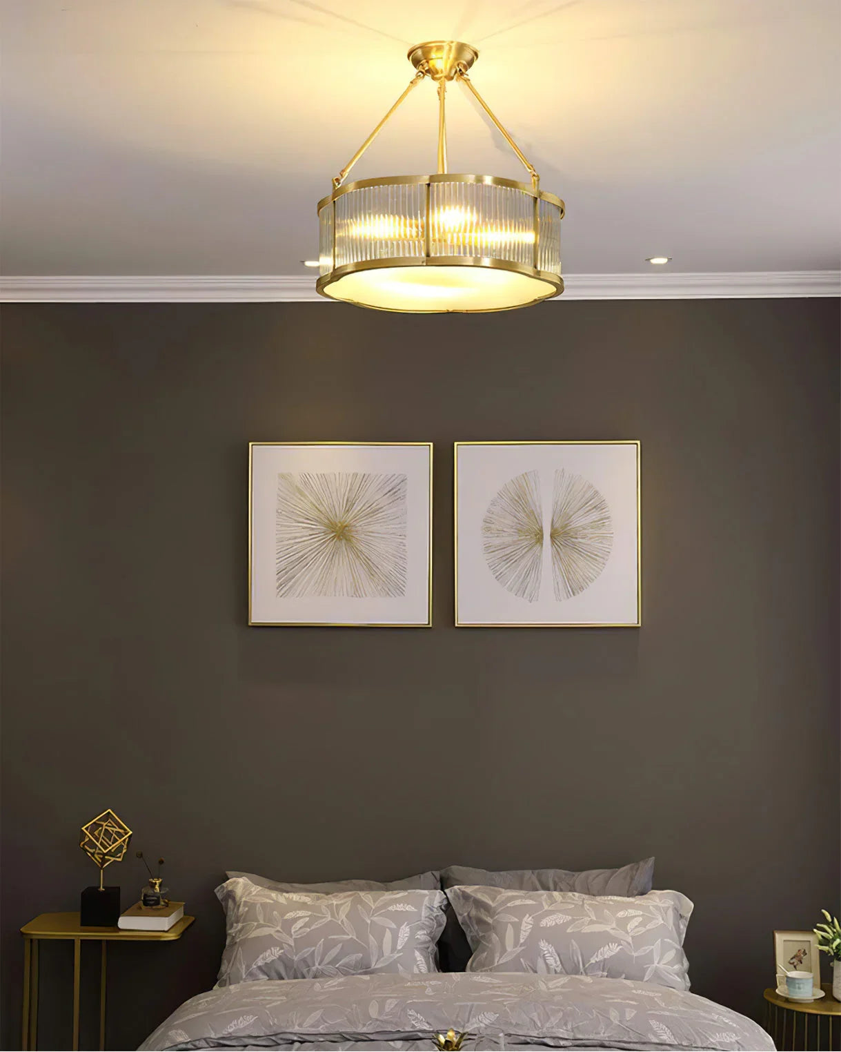 Modern brass and glass chandelier pendant lamp above stylish bedroom decor, YH Lamps