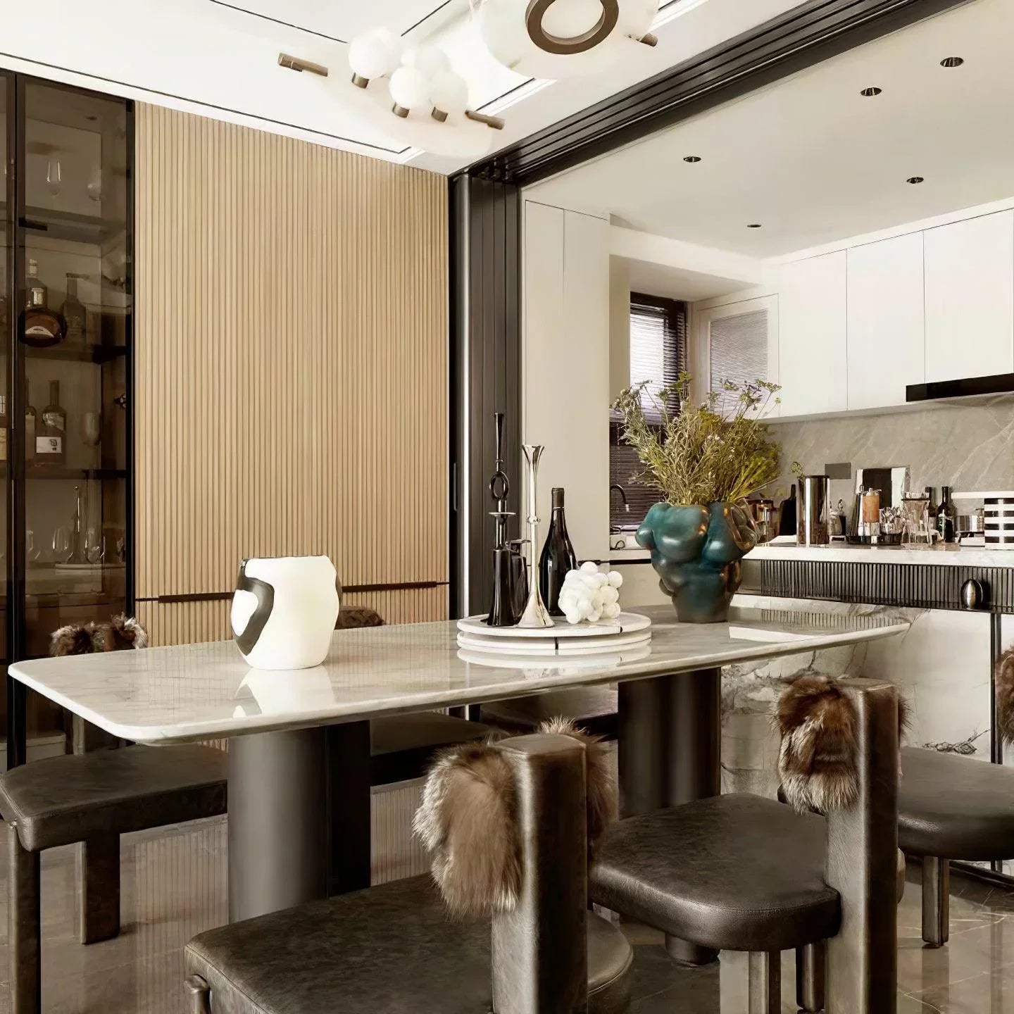 Modern dining room with marble table, dark chairs with fur accents, abstract sculpture centerpiece, and beige paneled wall
