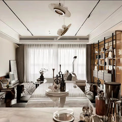 Modern living room with long glossy table, decorative vases, large window with sheer curtains, and bookshelf