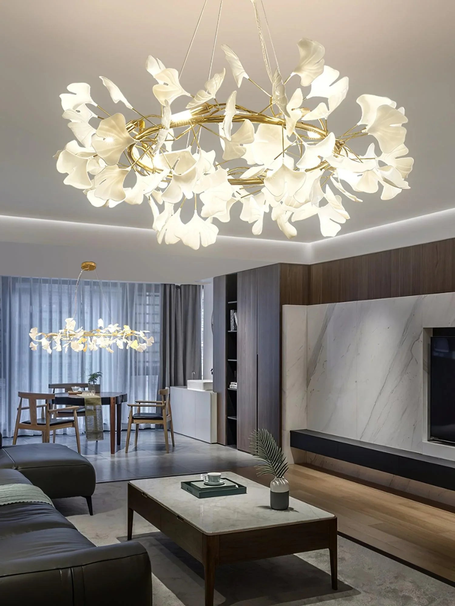 Modern living room with gold and white gingko leaf chandelier pendant lamps, elegant home lighting