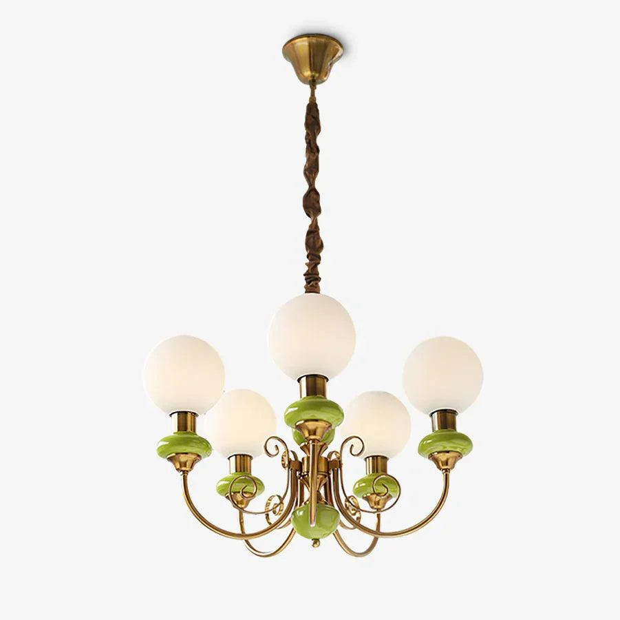 Modern chandelier pendant lamp with 5 white globe lights, green accents, and gold metal finish