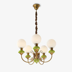 Modern chandelier pendant lamp with 5 white globe lights, green accents, and gold metal finish