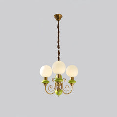Modern 3-head chandelier pendant lamp with gold metal arms and green ceramic accents, frosted white glass globes