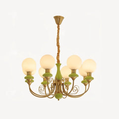 Elegant chandelier pendant lamp with seven white glowing globe lights, gold metal and green ceramic accents