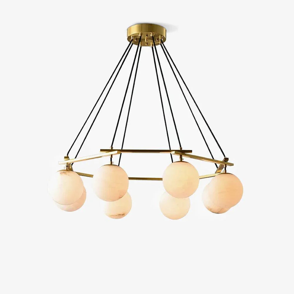Modern chandelier with six alabaster globe lights and brass frame hanging from black cords
