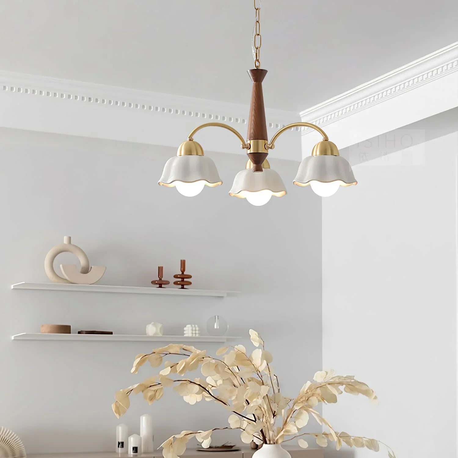 Modern 3-head brass and walnut wood pendant chandelier with white petal-shaped shades in minimalist room