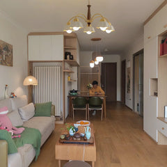 Modern living room and dining area with YH Lamps brass pendant chandelier with white flower-shaped shades