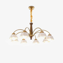 Modern chandelier with eight white frosted glass shades, brass arms, and walnut wood accent, Swedish design