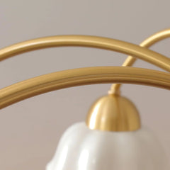 Close-up of modern brass chandelier arc with white glass shade, Swedish minimalist lighting design