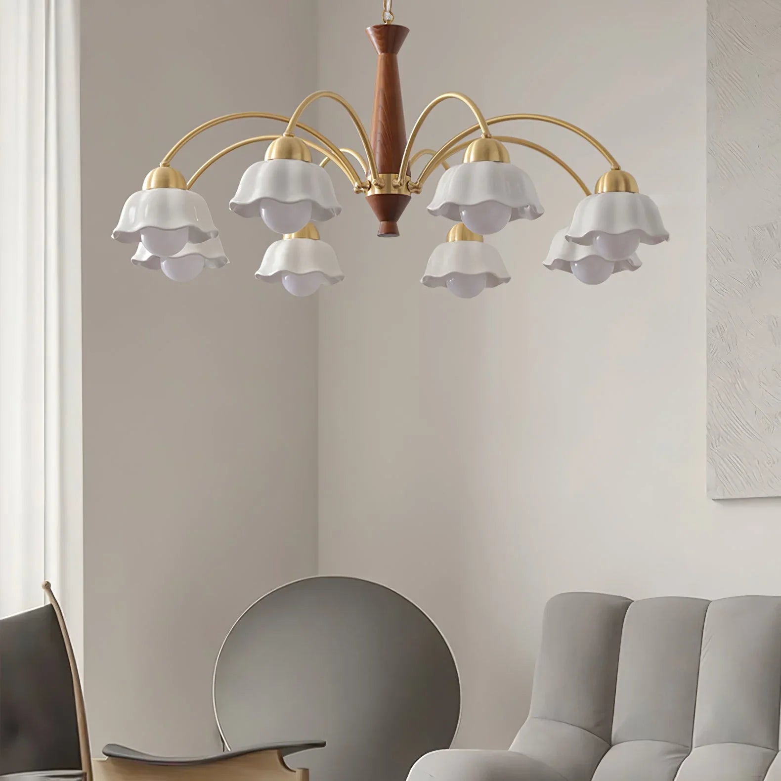 Modern Swedish chandelier with brass arms, walnut wood center, and white flower-shaped glass shades