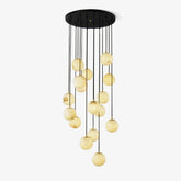 Modern chandelier with 16 alabaster glass globe lights hanging from black round canopy pendant lamp