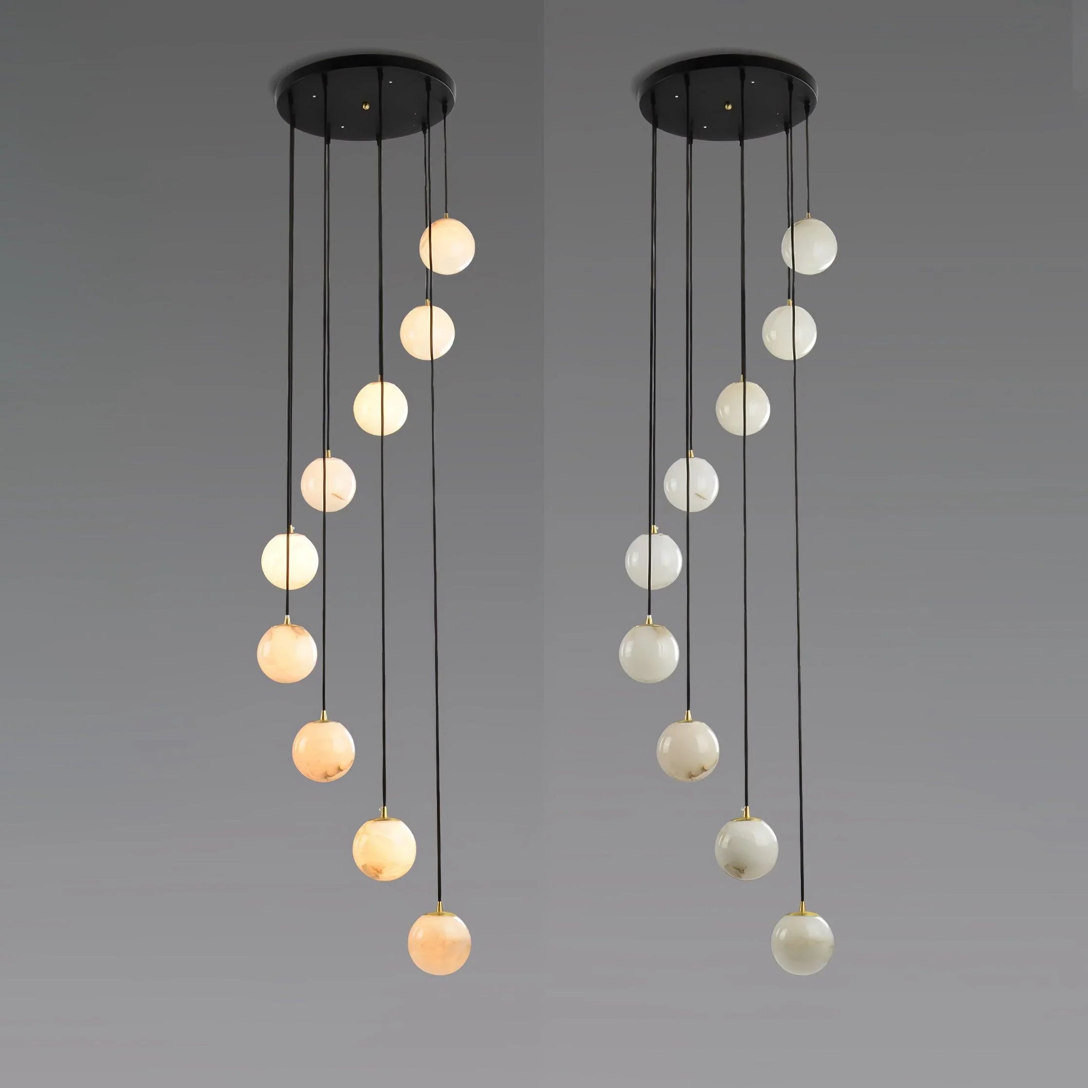 Modern chandelier with multiple hanging alabaster ball pendants and black round canopy from YH Lamps
