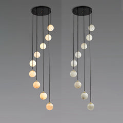 Modern chandelier with multiple hanging alabaster ball pendants and black round canopy from YH Lamps