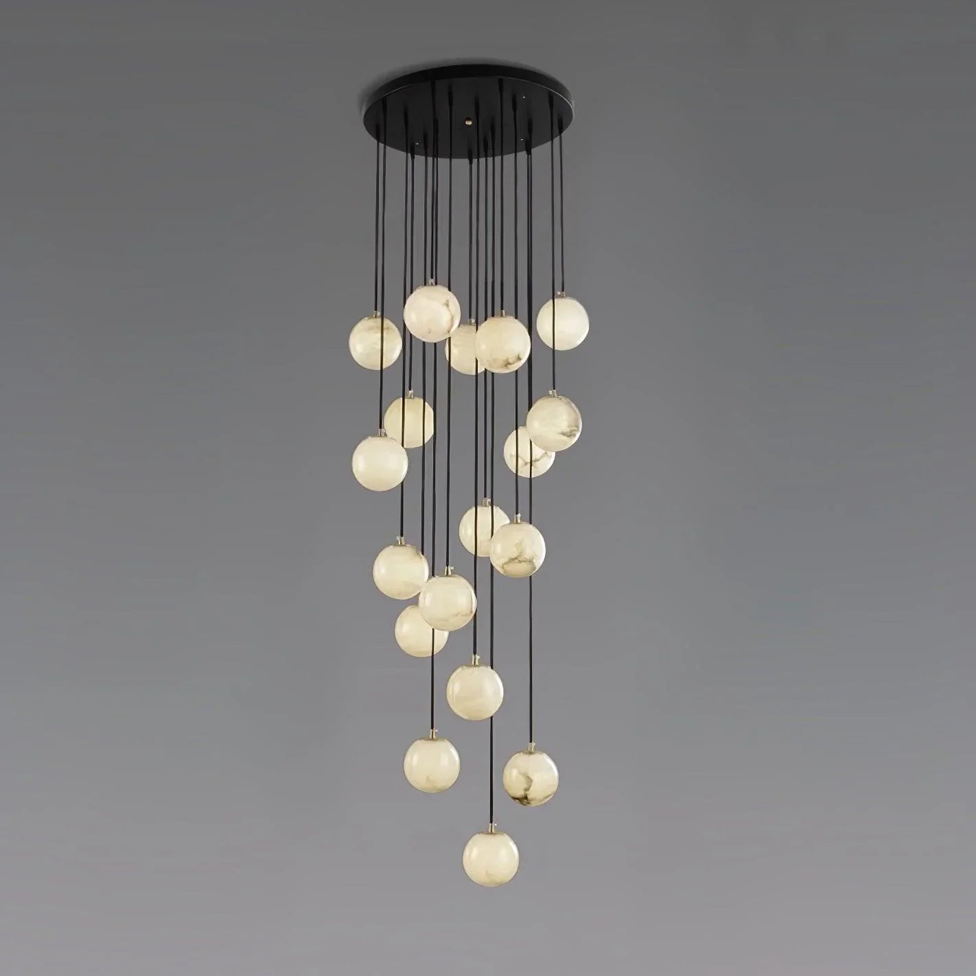 Modern chandelier with 20 alabaster globe lights hanging from round black canopy by YH Lamps