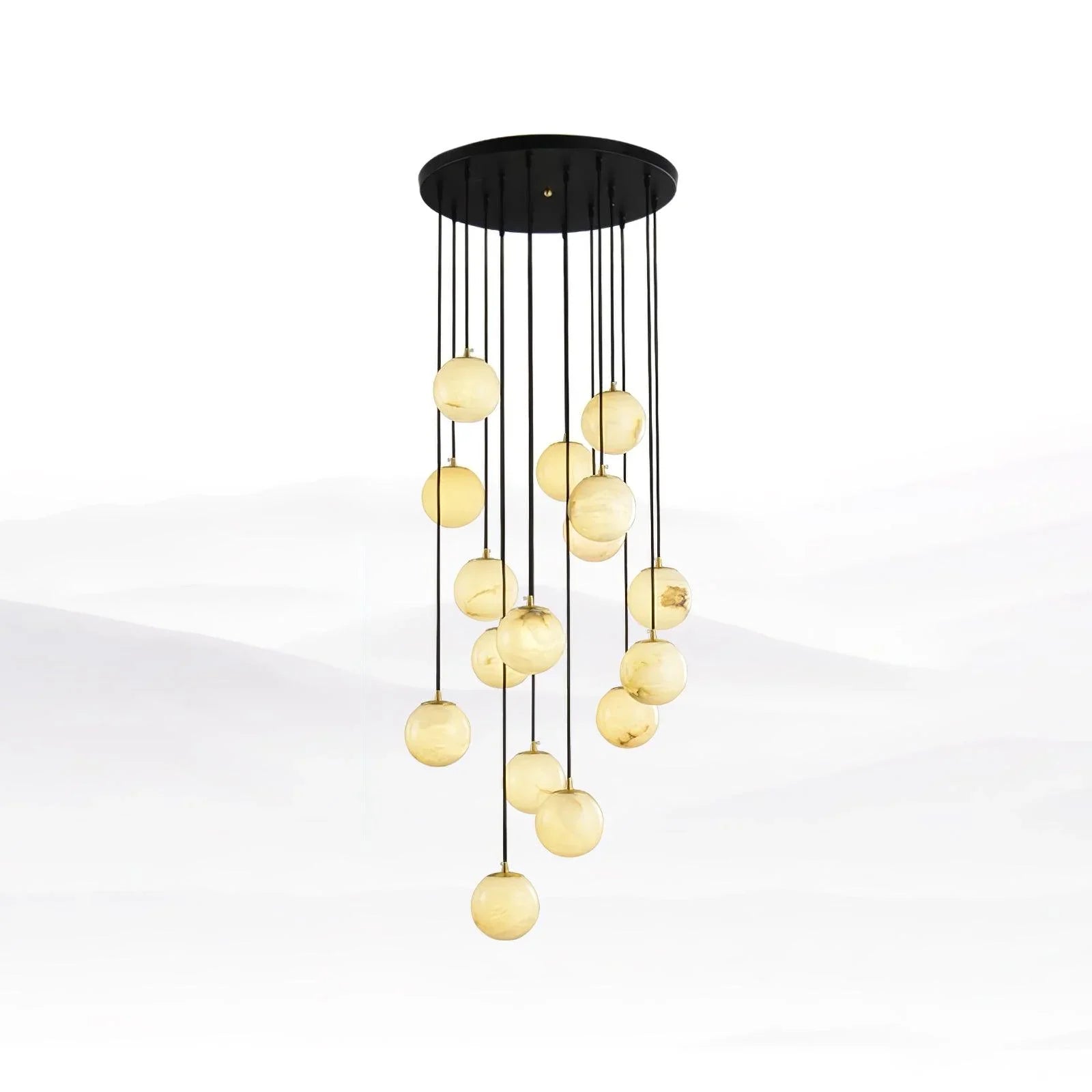 Modern chandelier with 16 alabaster globe pendant lights hanging from black round canopy