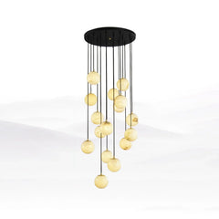 Modern chandelier with 16 alabaster globe pendant lights hanging from black round canopy