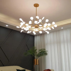 Modern gold ceiling chandelier with multiple white LED lights in a stylish living room with dark wall and white curtains