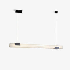Modern rectangular alabaster pendant chandelier with black metal mounts and warm light suspension