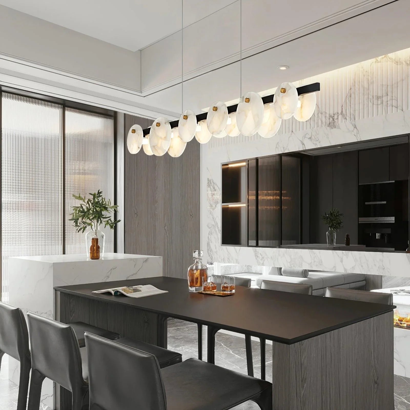 Modern dining room with black table, leather chairs, and long pendant chandelier with white brass lamps at YH Lamps