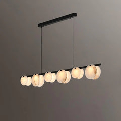 Modern linear pendant chandelier with 7 round alabaster glass lamps on black metal frame