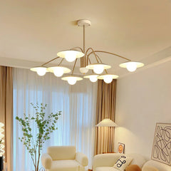 Modern gold and white 6-head pendant chandelier with opal glass shades in stylish living room