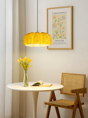 Modern yellow pumpkin pendant chandelier over round table with flowers, YH Lamps home lighting