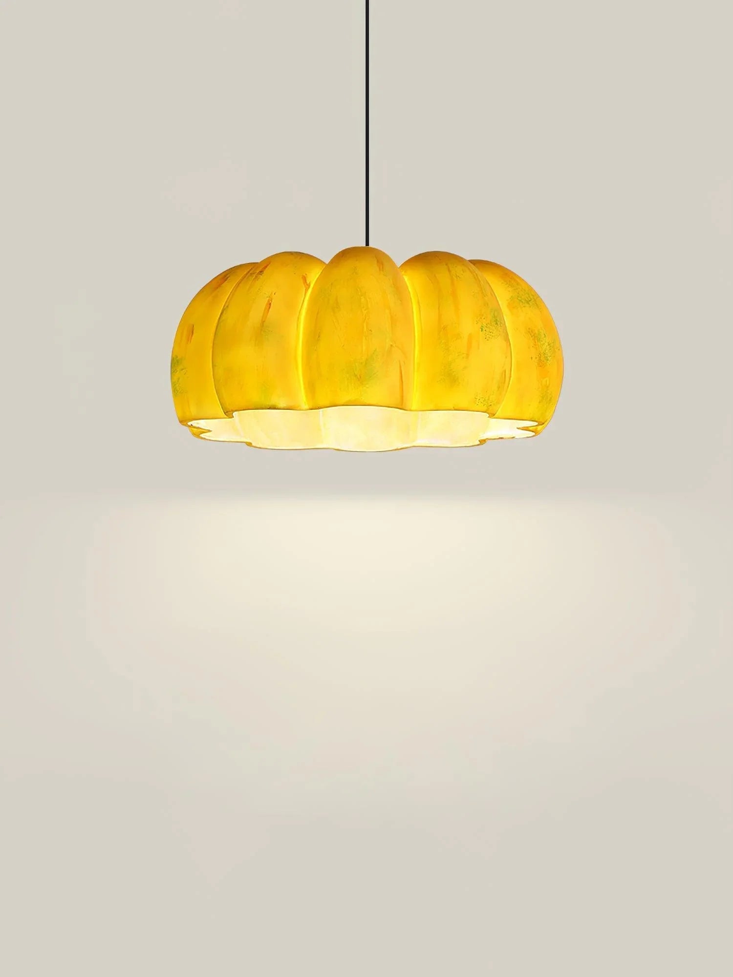 Yellow pumpkin-shaped pendant lamp chandelier on a neutral background from YH Lamps.