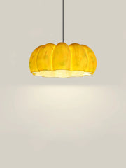 Yellow pumpkin-shaped pendant lamp chandelier on a neutral background from YH Lamps.