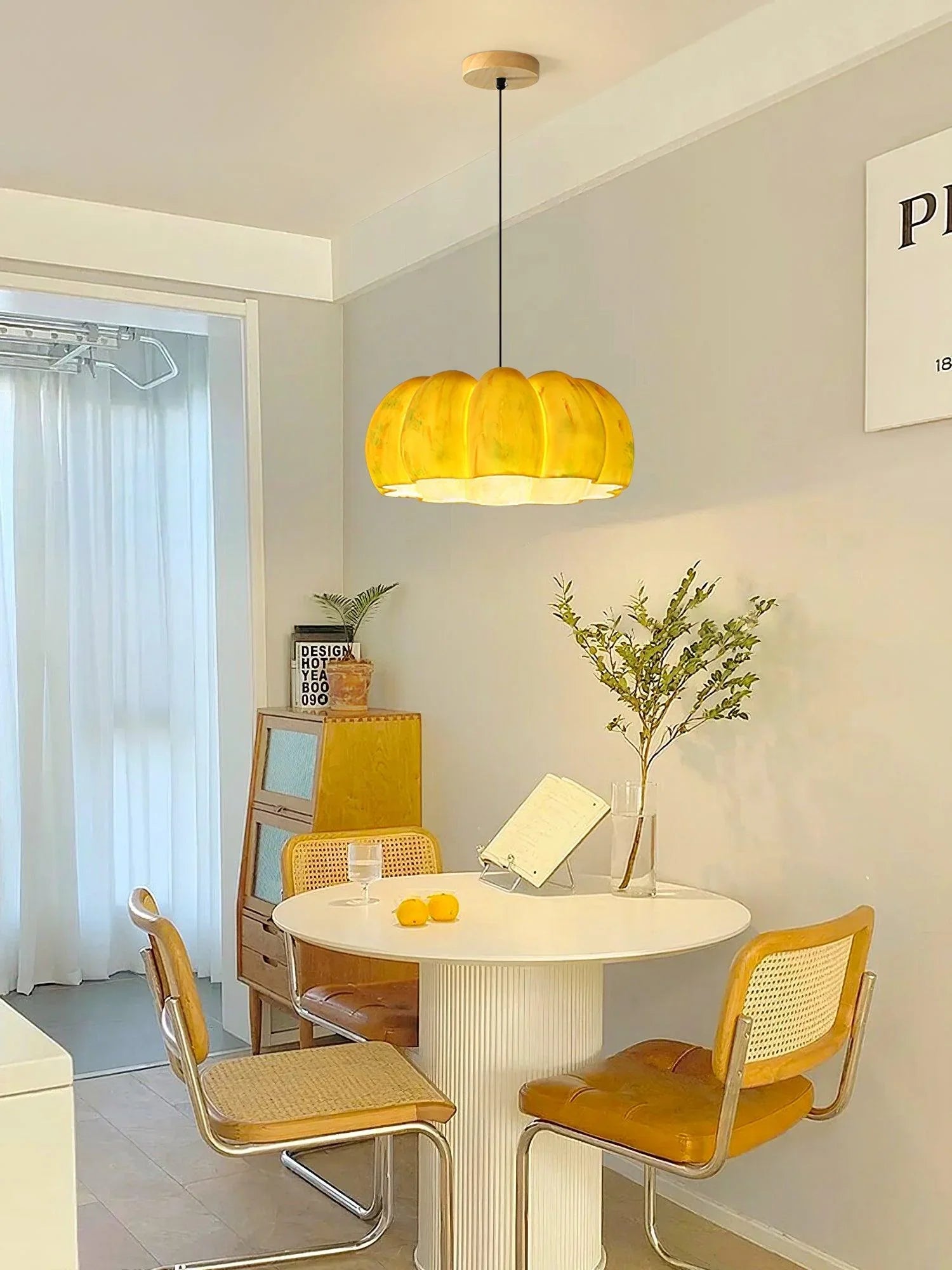 Modern yellow pumpkin pendant chandelier above round dining table, YH Lamps home lighting