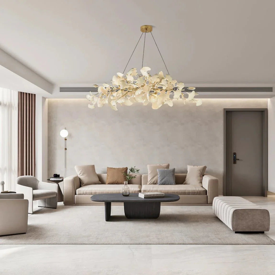 Modern living room with beige sofa, dark wood coffee table, and artistic gold-white ginkgo chandelier pendant lamp