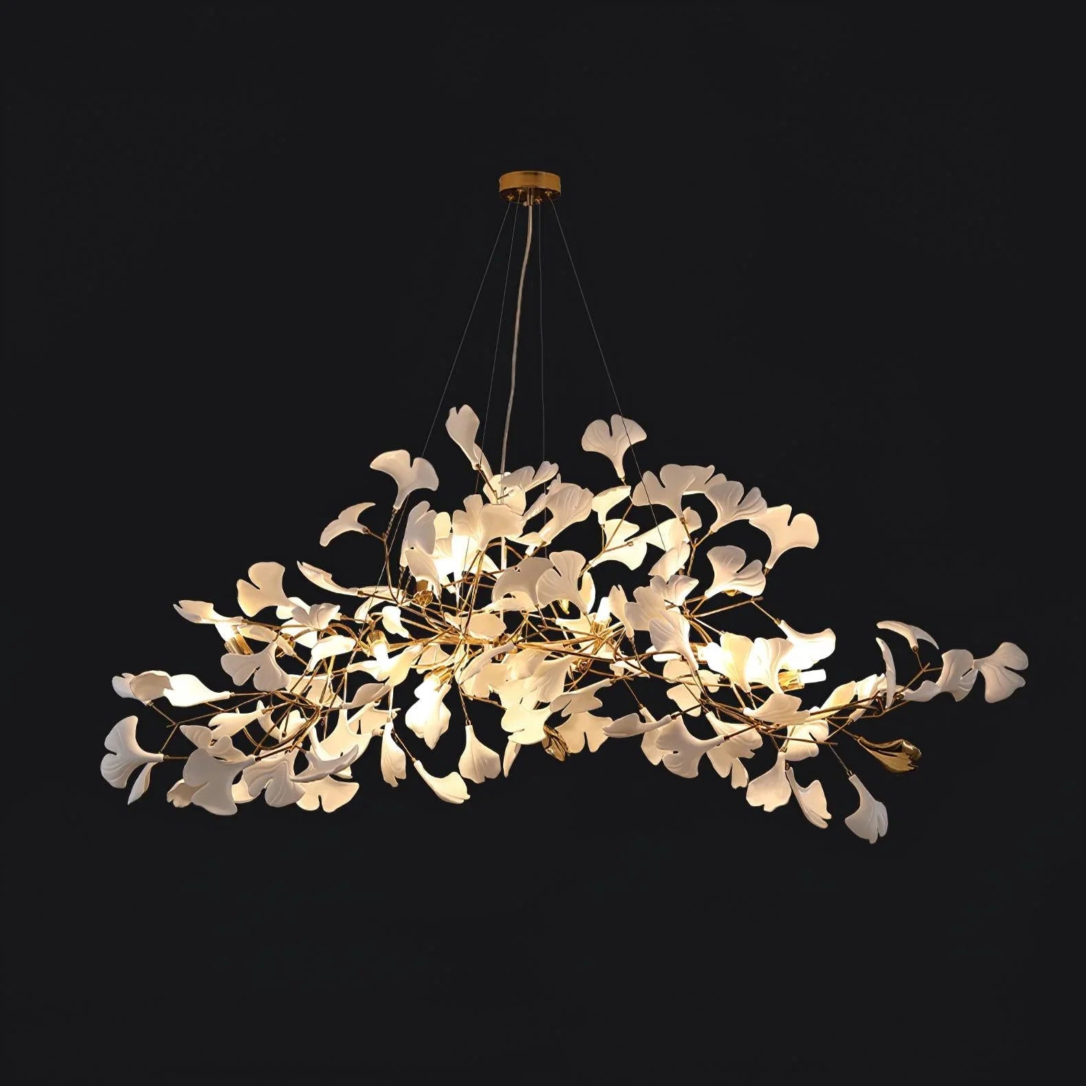 Gold and white modern ginkgo leaf chandelier pendant lamp with intricate design, illuminated against black background