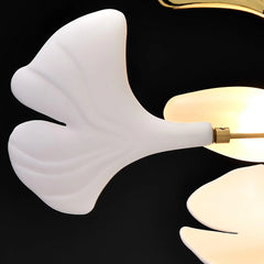 Close-up of YH Lamps gold and white Gingko leaf chandelier pendant light with smooth curved petals