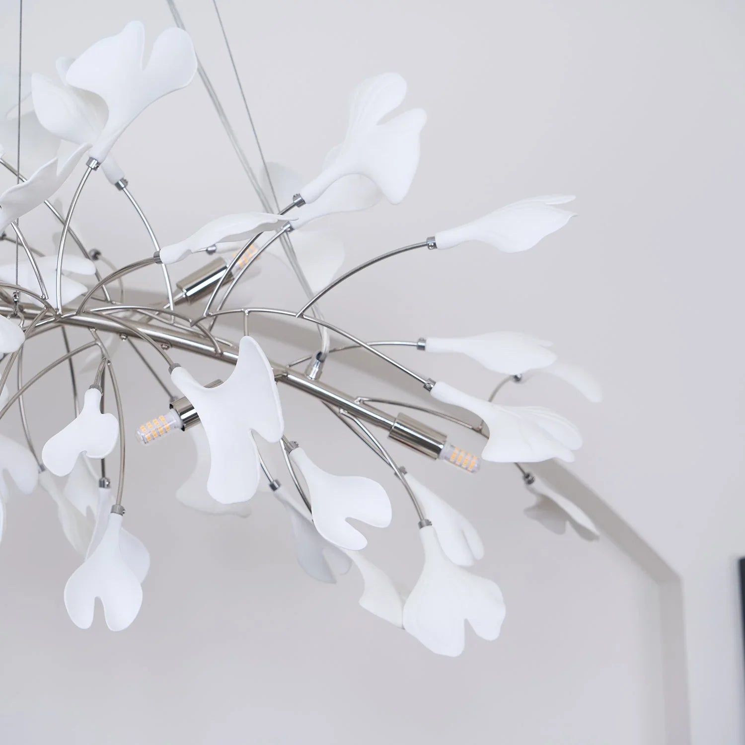 Modern white ginkgo leaf pendant chandelier with silver metal frame, stylish home lighting fixture