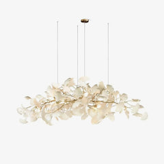 Modern gold and white pendant chandelier with delicate ginkgo leaf design, suspended by three wires