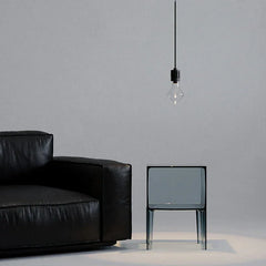 Modern nickel pendant lamp above glass table and black leather sofa, YH Lamps designer lighting